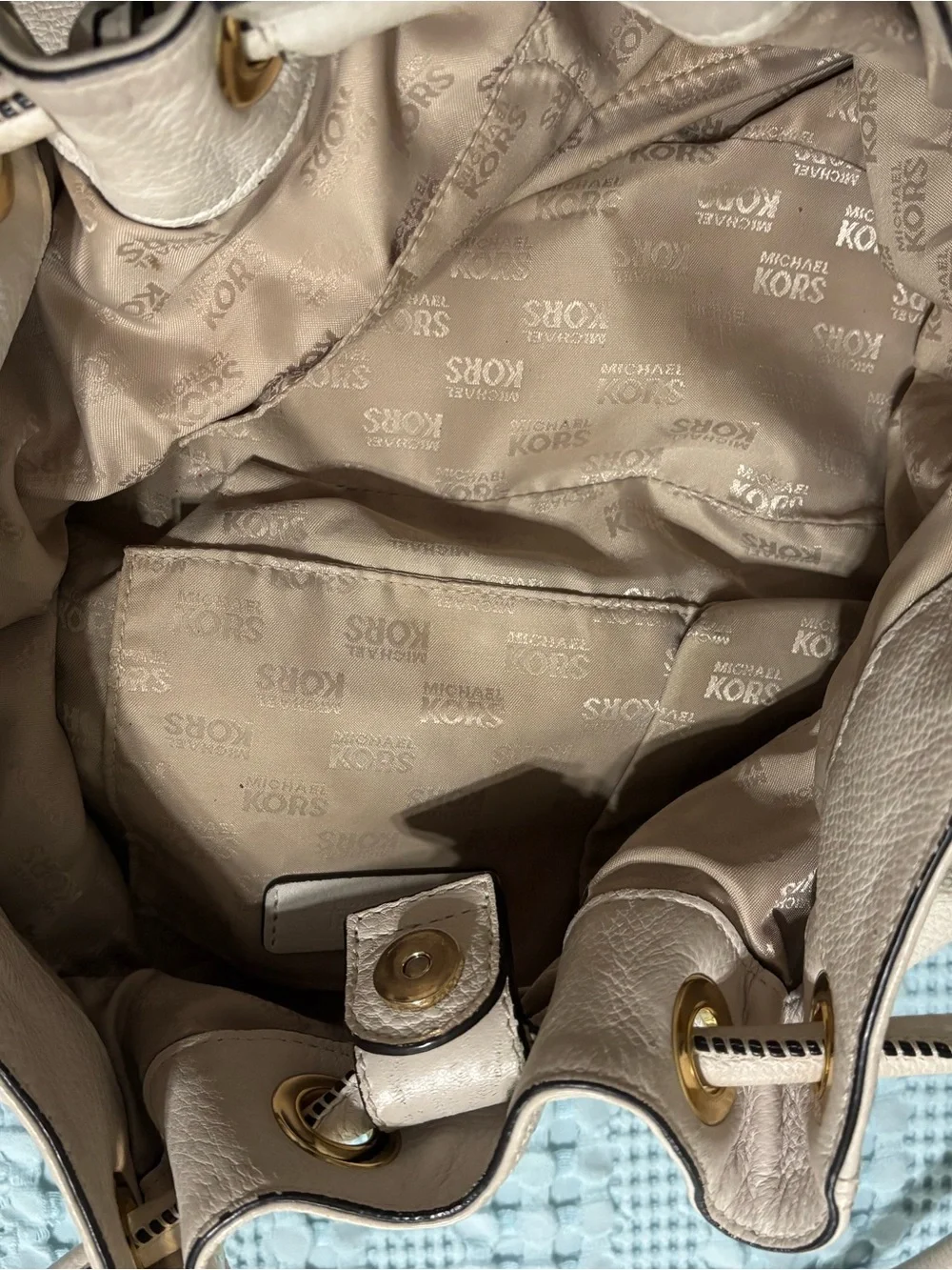 Michael Kors Cream Leather Drawstring Shoulder Bag with Tassel and Gold Hardware